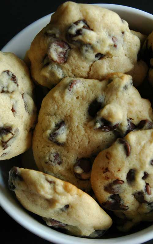 Lots of hands will reach for the cookie jar when these favorite Soft Chocolate Chip Cookies are inside! Keep it filled with ease, since this recipe makes a bunch.