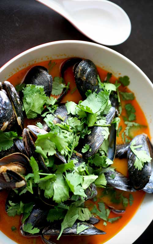 These Thai Curry Mussels make a beautiful gourmet-style dinner, and they're easy to make too! If your mussels are already clean and ready to go, this dish can literally be on your table in just minutes.