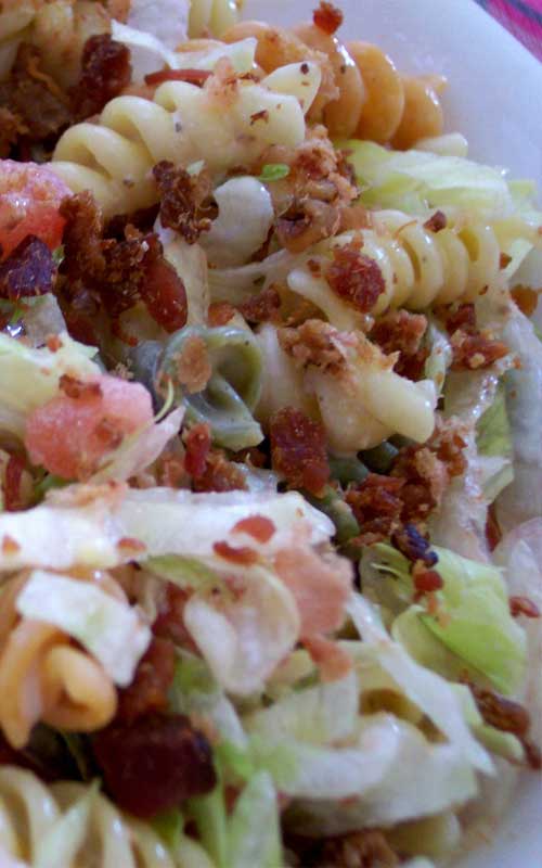 Recipe for BLT Pasta Salad - This is an easy and flavorful pasta salad that I'm always asked to bring to potlucks. You can have it ready in under 20 minutes! It is really that easy.