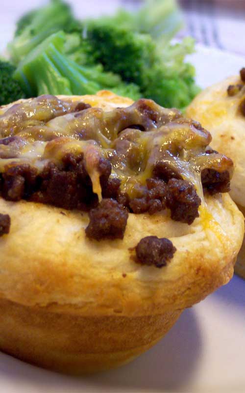 Refrigerated biscuits become the edible bowls for these zesty, cheese-topped BBQ Cups. Winner!!