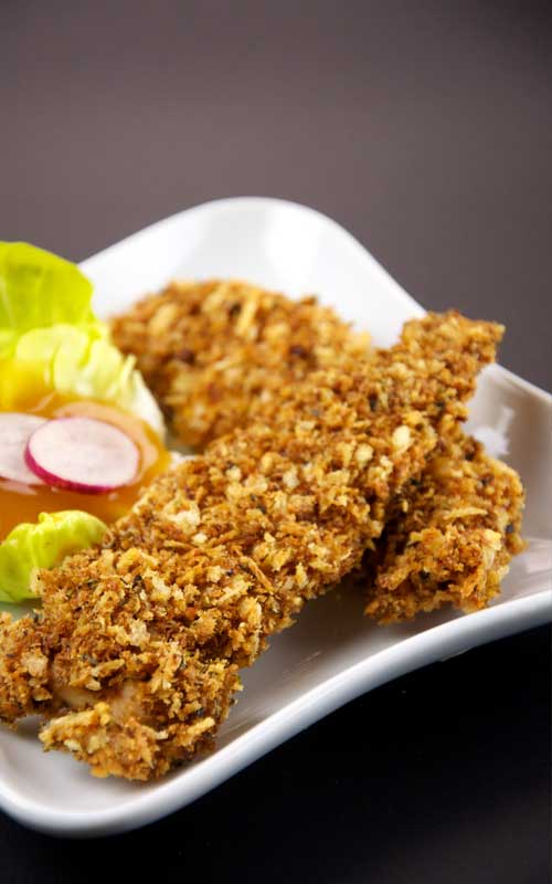 Recipe for Caribbean Coconut Chicken - This twist on the traditional coconut shrimp is sure to please. Try these crispy-salty-sweet tenders at your next party!Recipe for Caribbean Coconut Chicken - This twist on the traditional coconut shrimp is sure to please. Try these crispy-salty-sweet tenders at your next party!