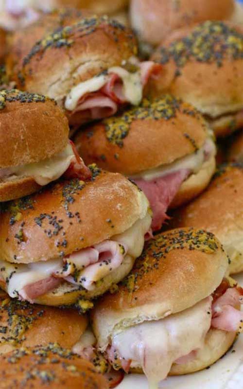 These Ham and Cheese Sliders are completely addictive, thanks to the buttery and tangy sauce drizzled on top of them. Delish!