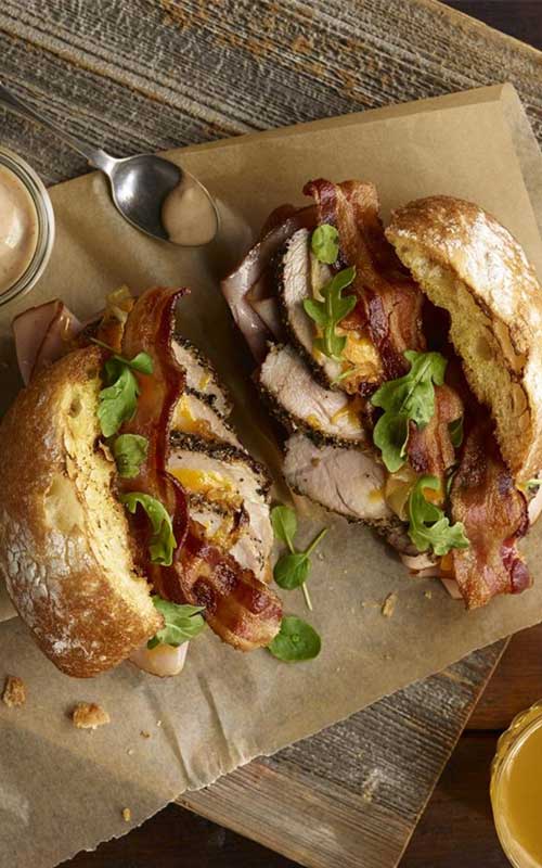 Recipe for Porkinator Sandwiches - An easy, delicious sandwich that everyone is sure to love. It combines the taste of fresh pork, BBQ and ranch all on a tasty ciabatta sandwich roll.