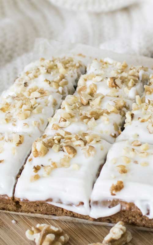 Recipe for Carrot Cake Bars with Cream Cheese Frosting - All the yummyness of your favorite carrot cake, but in bar form! These Carrot Cake Bars with Cream Cheese Frosting are easy to make, and disappear even faster!