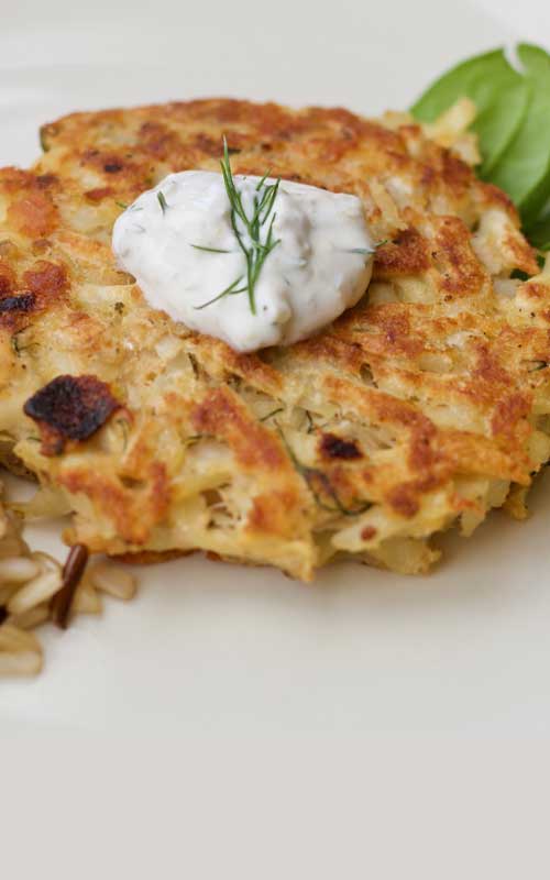 Frozen hash browns and flaked salmon come together for a twist on this traditional Swiss favorite, Salmon Rosti. We love the creamy dill sauce, but a little bit of ketchup is tasty too!