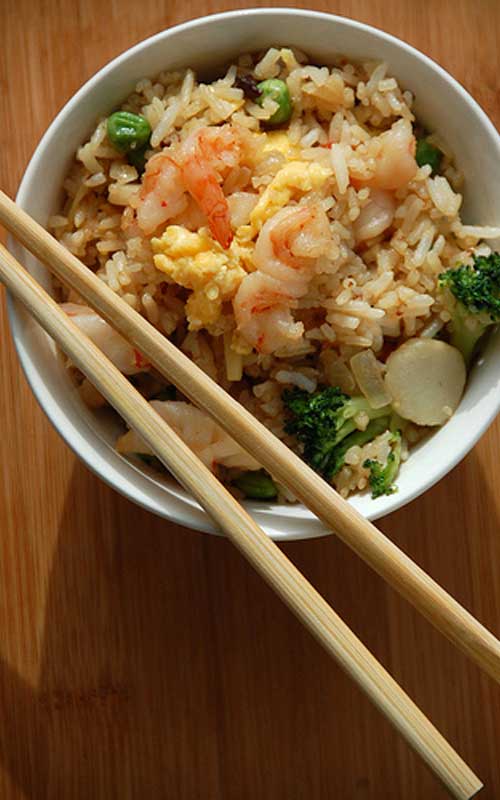 This super easy Shrimp Fried Rice is loaded with shrimp and veggies, all tossed in a perfectly balanced sauce. Ready in less than 30 minutes, this may be your next go-to dinner recipe that they can't get enough of!